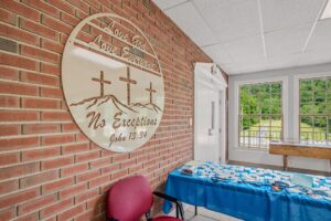 Hallway with the ’No Exceptions’ sign