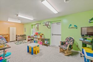 Nursery with toys and rocking chair